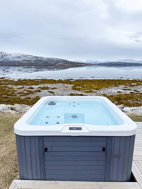 istock Hot Tub Overlooking Tranquil Fjord Landscape 2220081314