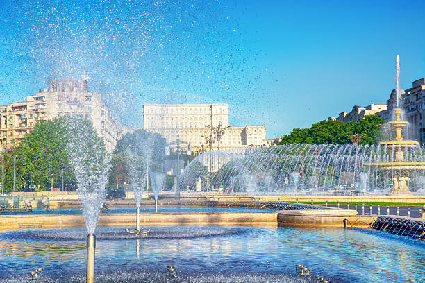 Detail of the fountain carved by iron . Splashing water in city park