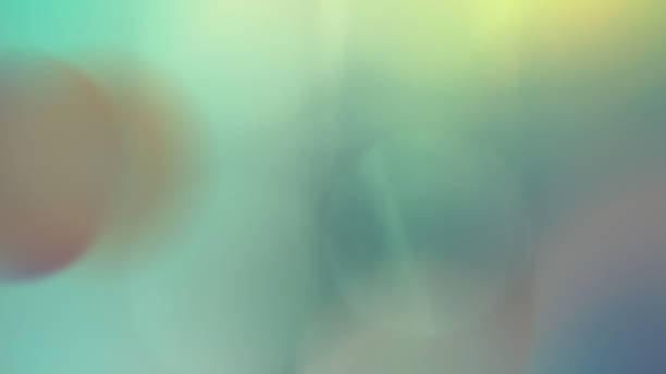 istock Soft Pastel Bokeh Background with Aqua and Yellow Light Blur 2220090042