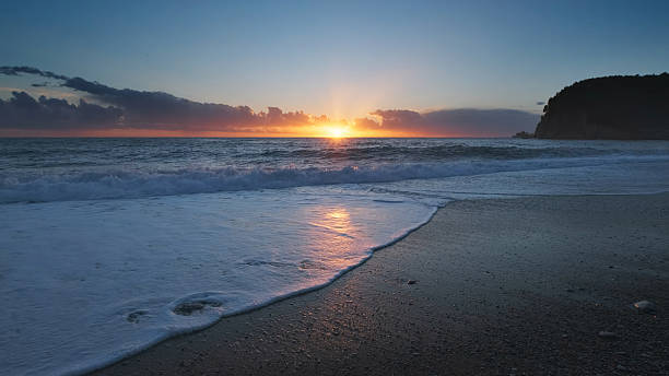 istock Sunset over sea with vibrant colors 2220093407
