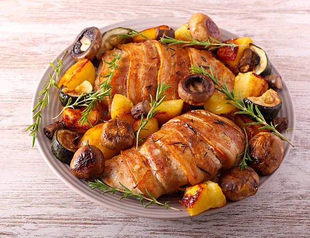 istock Roast rosemary turkey fillet wrapped in bacon 2220095055