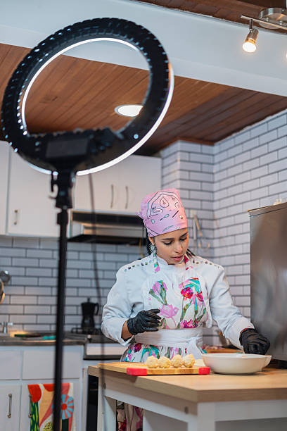 istock Female chef prepares food for a catering event 2220101808