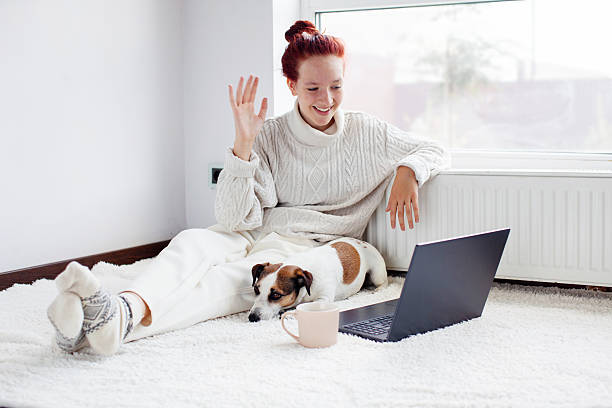 istock Young Woman have video call on laptop 2220102043