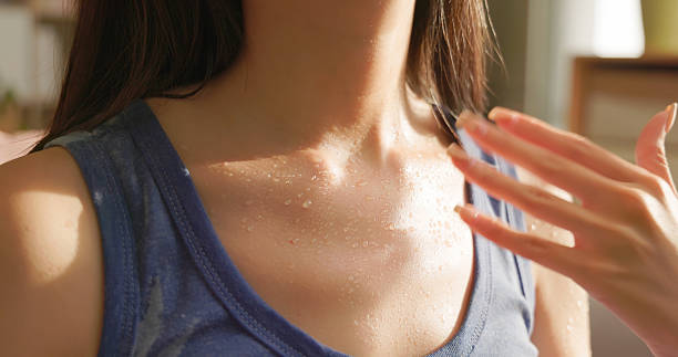 woman sweating summer discomfort