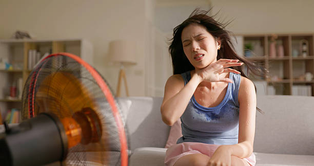 istock woman hot summer discomfort 2220102145