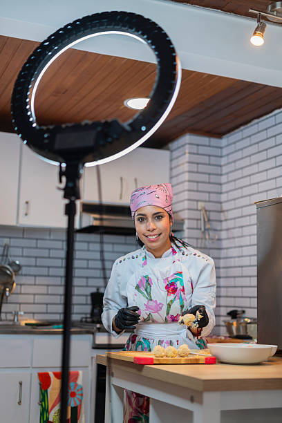 istock Female chef prepares food for a catering event 2220102172