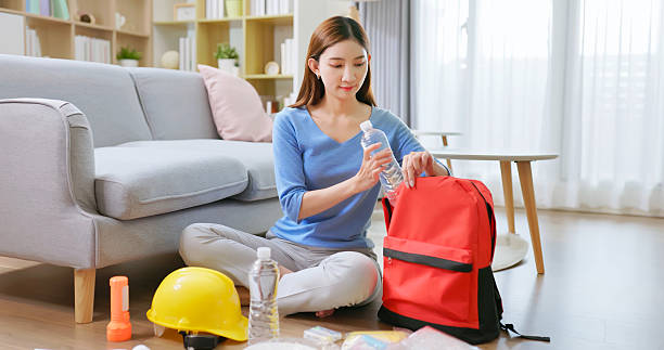 istock Asian woman Emergency Kit Prep 2220102552