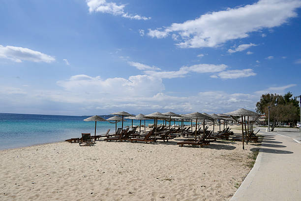 istock Greece, Sunbeds and umbrellas on Nikiti Beach. 2220106848