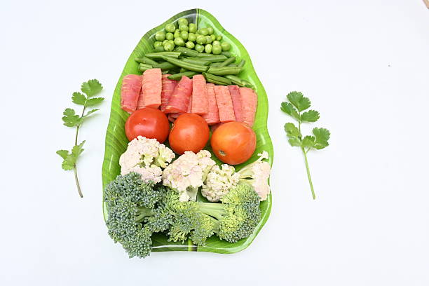 A vibrant selection of vegetables, fruits, and greens arranged aesthetically, promoting healthy eating and a natural lifestyle focus. Perfect for concepts of wholesome nutrition and wellness-themed visual content.