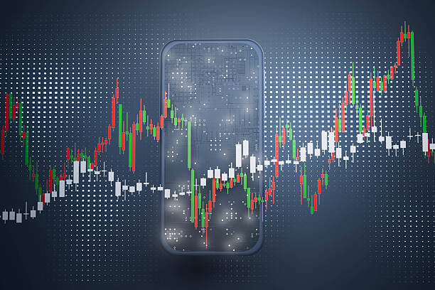 istock A cell phone is displayed on a screen with a graph of stock prices 2220111554