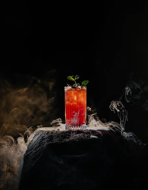 istock Smoky Red Cocktail on Dark Stone 2220112228