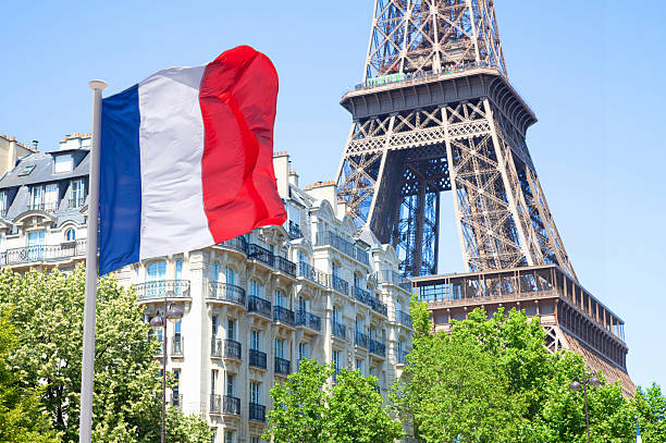 France Paris Eiffel tower with french flag flying