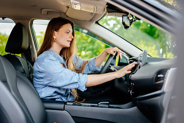 istock A confident young woman driving a car. 2220113355