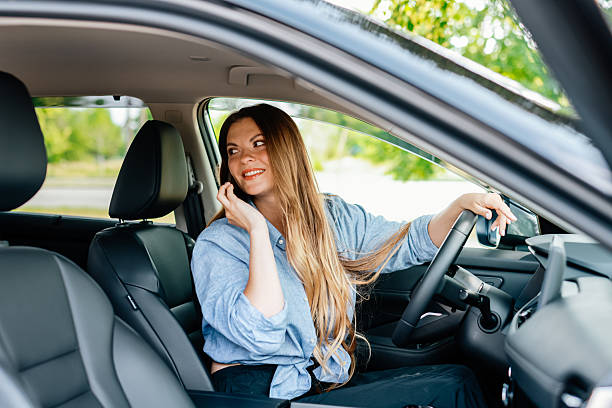 istock A confident young woman driving a car. 2220113361