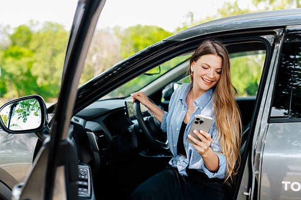 istock A confident young woman driving a car. 2220113406