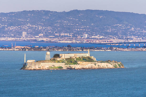 istock Alcatraz island in San Francisco Bay at sunset 2220117701