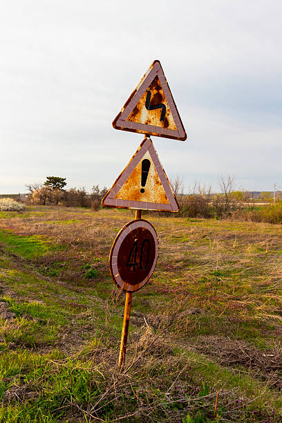 istock Weathered triple road sign - 