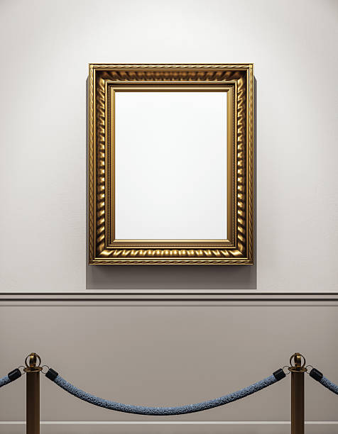 istock Empty golden picture frame hanging on a museum wall with rope barriers in front, under spotlight in modern exhibition hallway interior. 3D Rendering 2220122833
