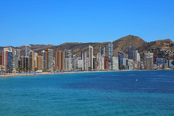 istock Benidorm High-Rise Skyline and Beachfront with Mountains in Background 2220123855