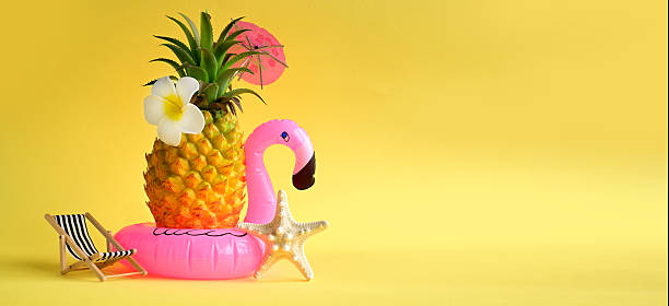 istock Pink inflatable flamingo and pineapple. Summer pool float party idea. Summer concept. 2220124476