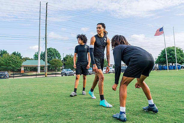 Over the shoulder view of a female soccer player.