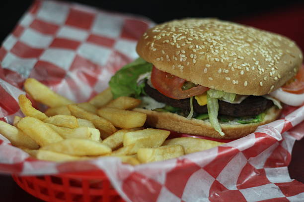 istock A classic hamburger served with crispy golden fries 2220132646