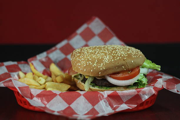 istock A beautifully arranged classic hamburger adorned with lettuce 2220132674