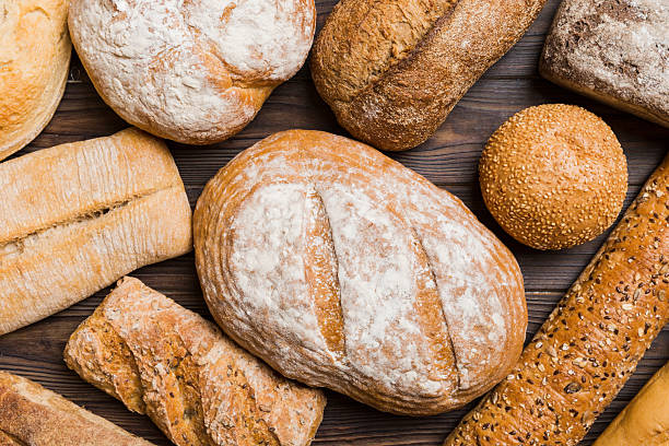 istock Homemade natural breads. Different kinds of fresh bread as background, top view with copy space 2220140991