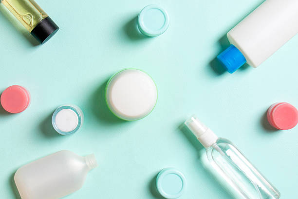 istock Group of plastic bodycare bottle Flat lay composition with cosmetic products on colored background empty space for you design. Set of White Cosmetic containers, top view with copy space 2220141019