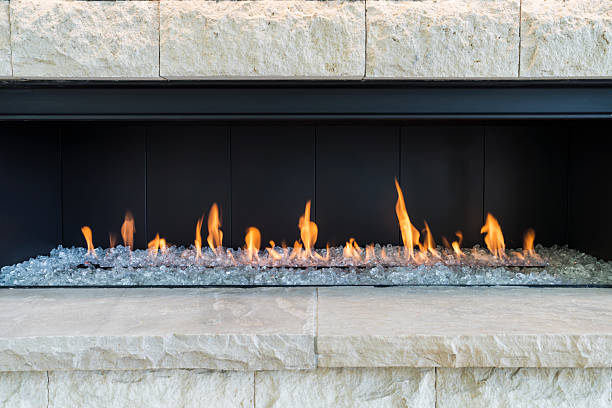 istock Modern Contemporary Fireplace with Orange Flames 2220145464