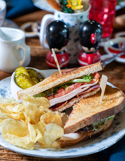 Turkey and cheese toastie with crisps and pickles
