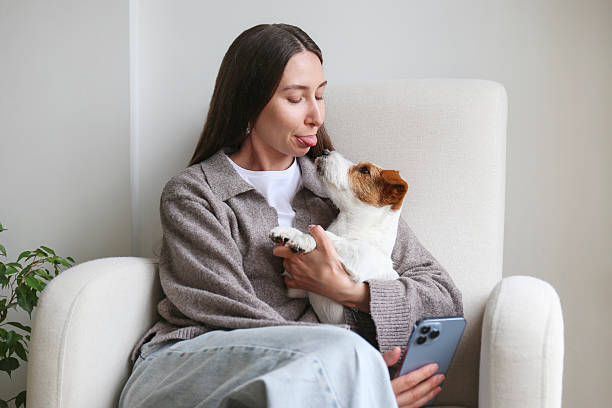 istock Young woman with her wire haired Jack Russell Terrier 2220148225