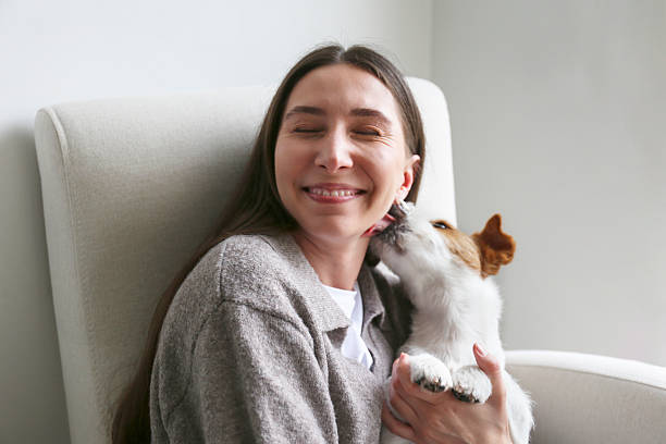 istock Young woman with her wire haired Jack Russell Terrier 2220148253