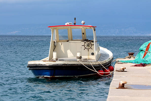 Fishing boat docked at the river bank