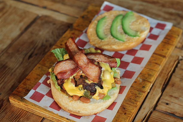 istock This mouthwatering burger features layers of crispy bacon 2220160987