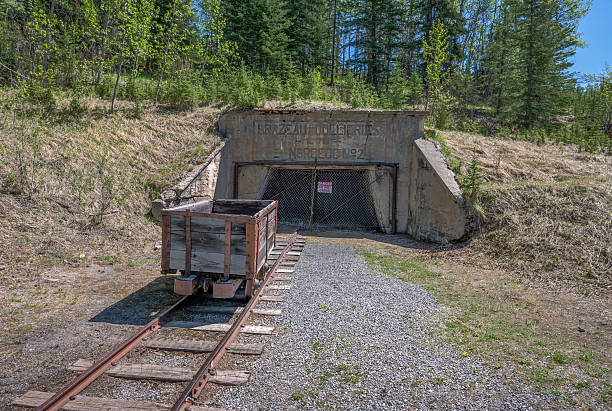 Abandoned coal mine entrance with a coal car at Nordegg, Alberta, Canada