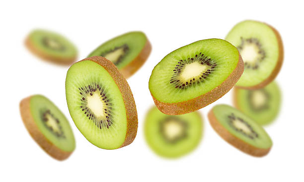 istock Falling Kiwi isolated on white background with clipping path, full depth of field 2220186676