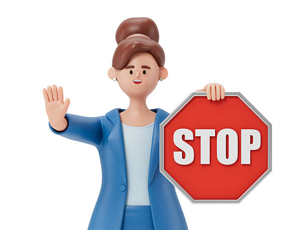 istock woman holding a stop sign 2220187700