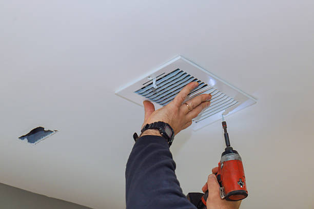 istock Installing a ceiling vent in a residential home during a home improvement project 2220188644