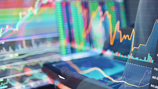 istock fintech user engaging with smartphone and tablet multiple financial dashboards on portable screens simultaneously synchronized trading apps with cryptocurrency analytics 2026 2220190060