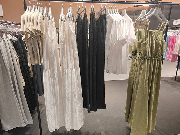 istock A rack in the store is filled with white, black and green . 2220190439