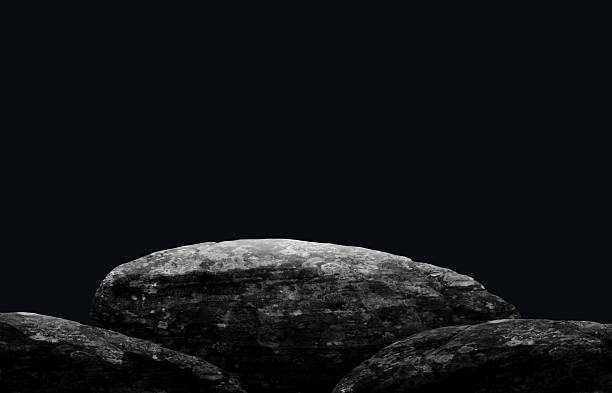 istock Stone podium on dark black background. 2220191307