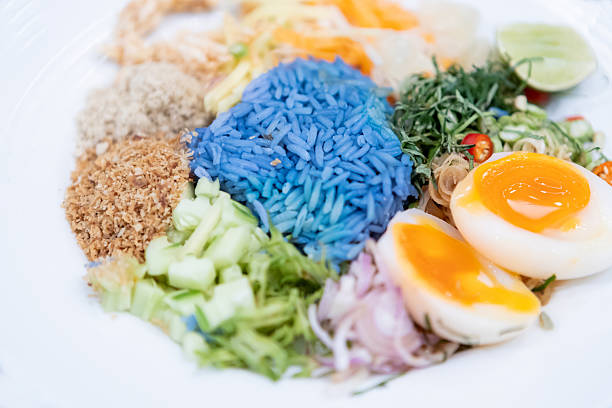 Southern Thai Rice Salad, Colorful Southern Thai rice salad with butterfly pea rice, soft-boiled eggs, herbs, and fresh vegetables , Thai food,  THAI CUISINE FROM FOUR REGIONS