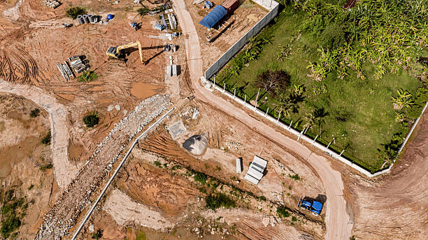 istock Aerial view of development of new road construction or overpass under construction 2220195618