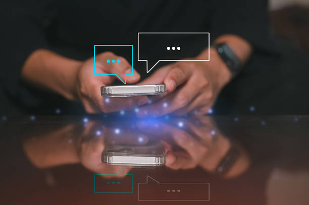 istock Social Media Man hand using smartphone typing live chat chatting on application communication digital web and social network concept. Social media application chat box 2220201930