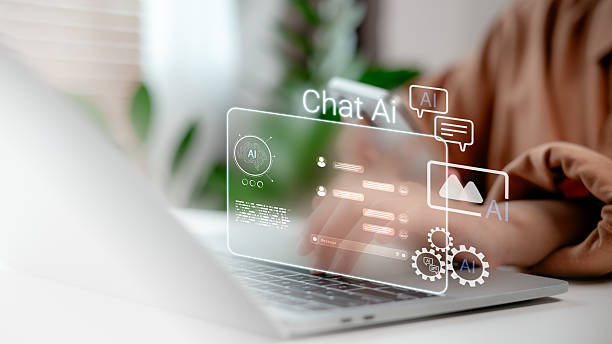 istock Close-up of a man using laptop with Chat AI interface on screen. Concept of artificial intelligence, chatbot technology, machine learning, and virtual assistant in digital workspace. 2220202264