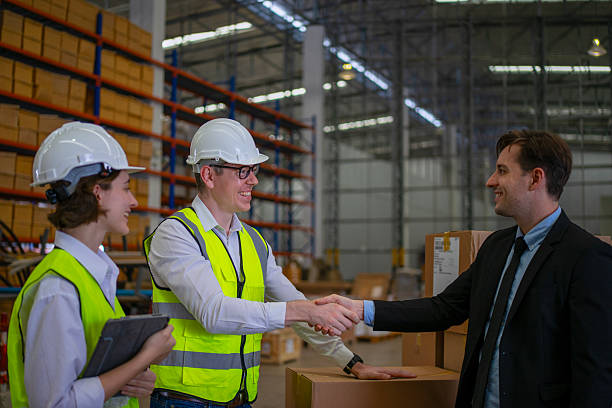 istock Blue collar workers are working and meeting at warehouse. 2220205155