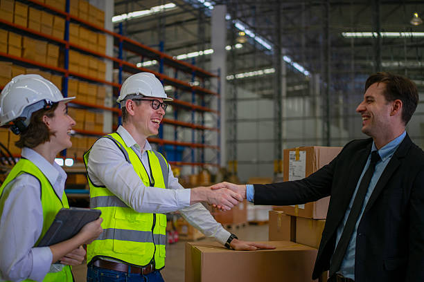 istock Blue collar workers are working and meeting at warehouse. 2220205162