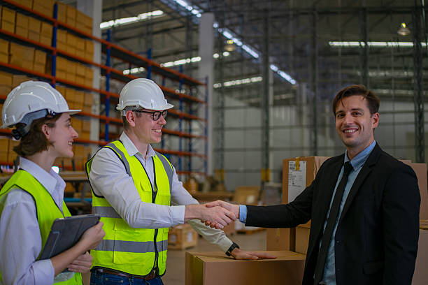 istock Blue collar workers are working and meeting at warehouse. 2220205163