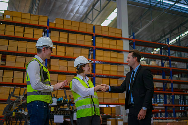 istock Blue collar workers are working and meeting at warehouse. 2220205167